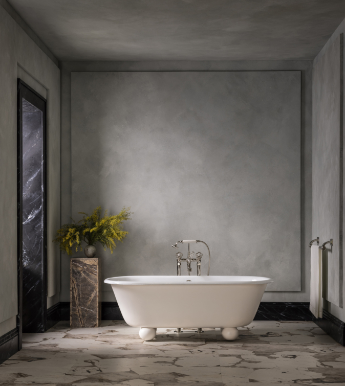 The Newton Cast Iron Bath Tub With Ball Feet has generous rounded proportions and unique ball feet for a timeless contemporary silhouette. Appearing to float ethereally, the design juxtaposes its traditional cast-iron construction.