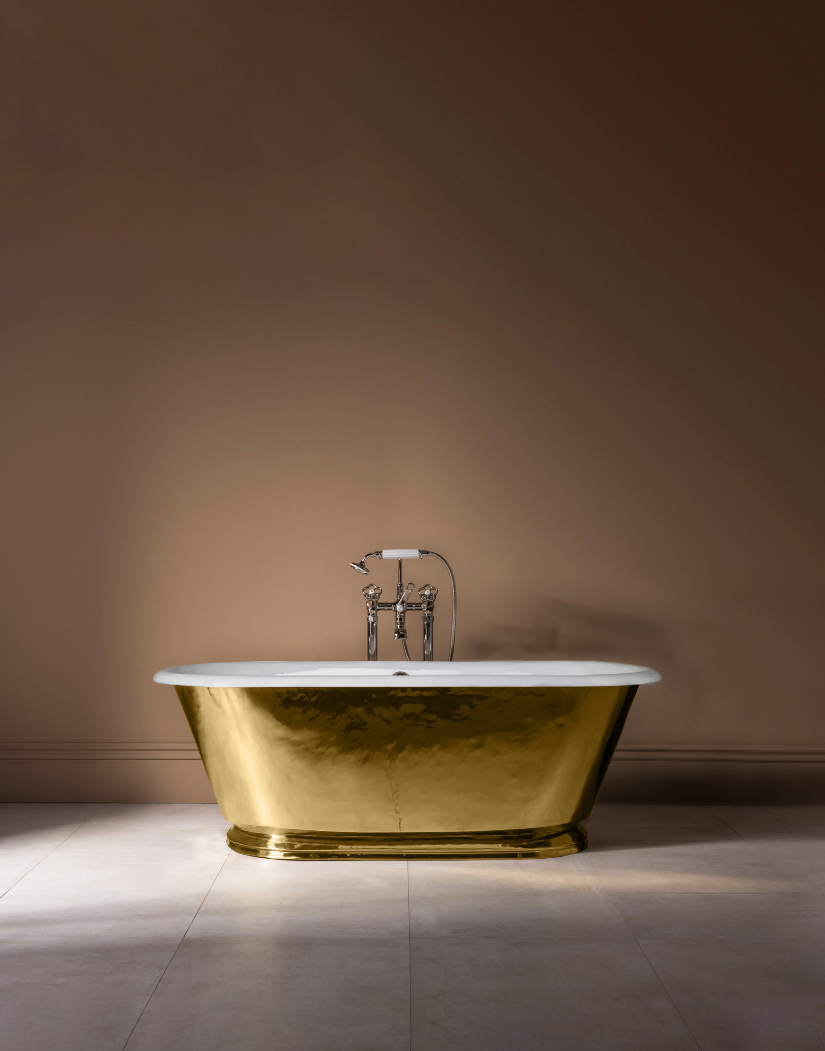 The Hammered Brass Tweed Cast Iron Skirted Bath Tub